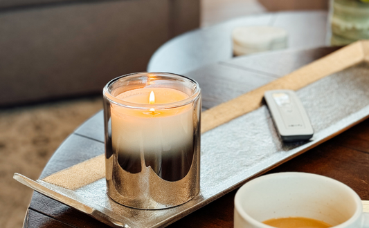 grounded candle lifestyle photo on a coffee table