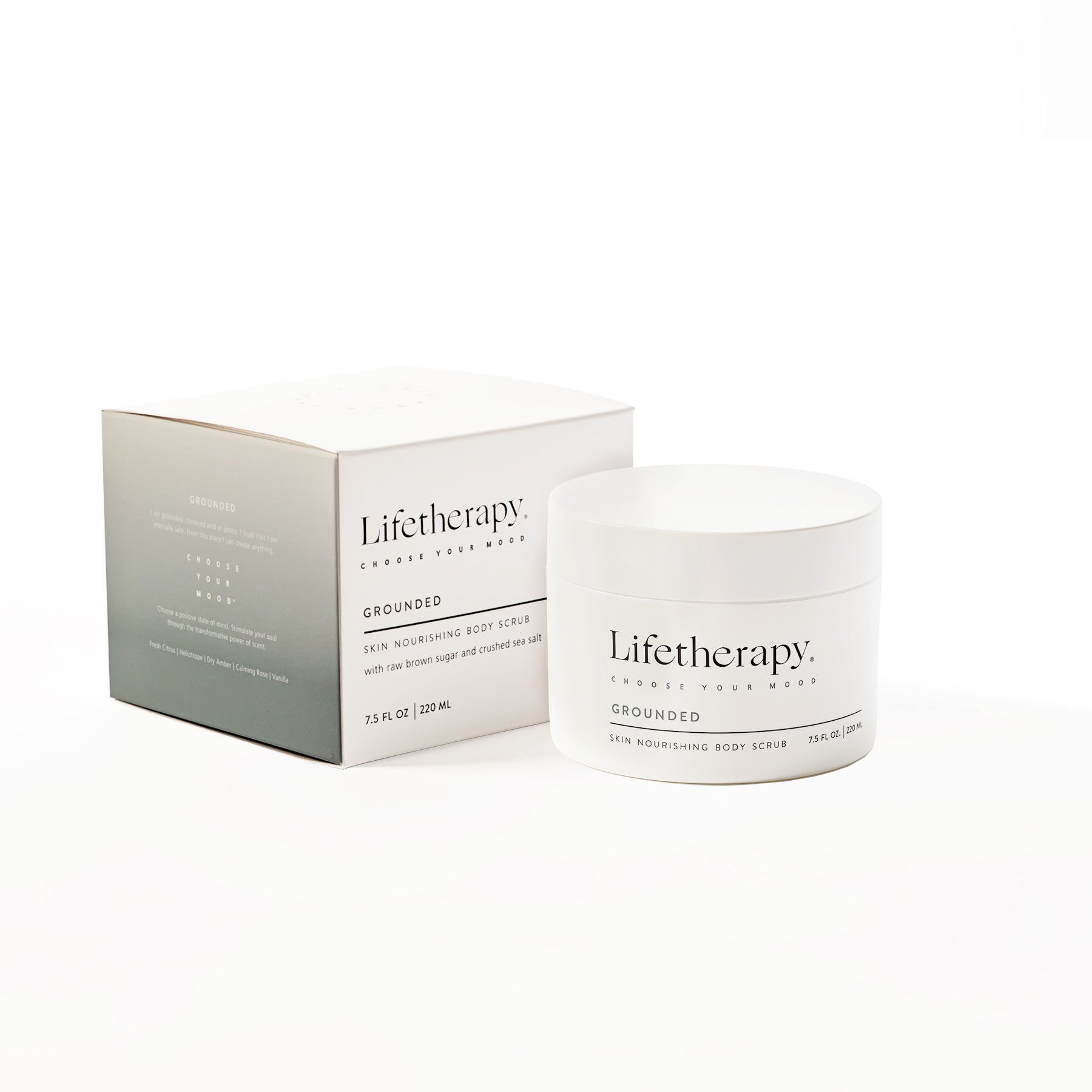 A jar of Grounded Skin Nourishing Body Scrub next to its packaging box, with the brand 'Lifetherapy' visible on both the product and packaging.